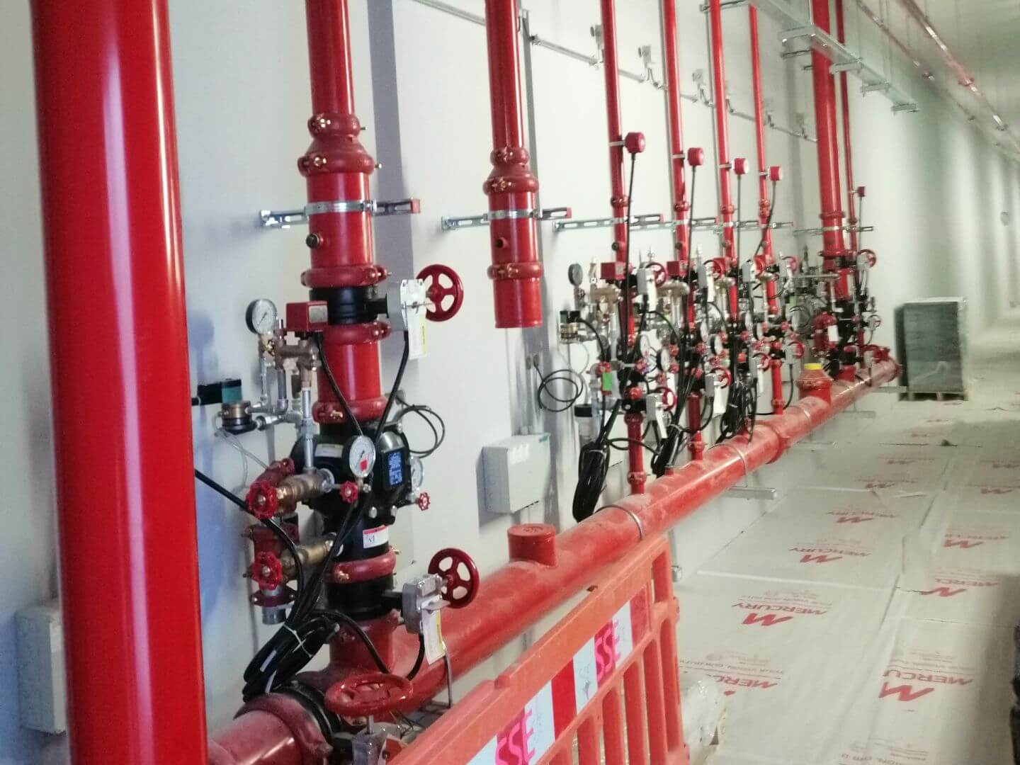 Hyperscale data center corridor piping columns